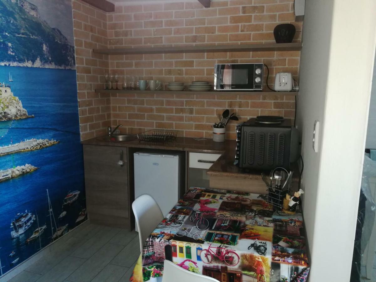 Posto Al Sole - Il Bacio Apartment เบลวิลล์ ภายนอก รูปภาพ